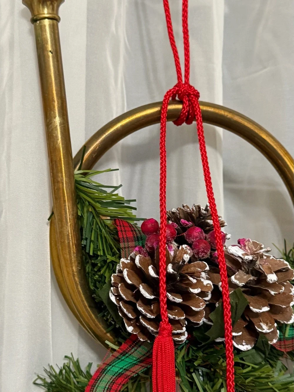Holiday Brass Horn Ornament with Pinecone and Red Tassel